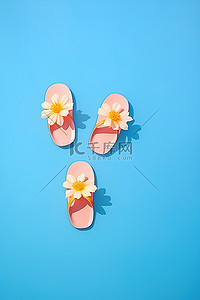 蓝色水仙花背景图片_漂浮在水中的小花作为人字拖，配有粉红色人字拖脚蹼和水仙花花
