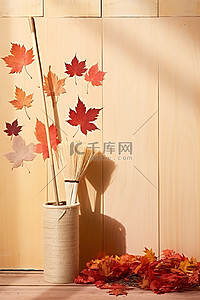 秋叶扫帚和 pom pom 靠近木架子