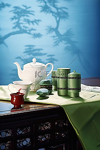 一张桌子，前面有杯子和茶具