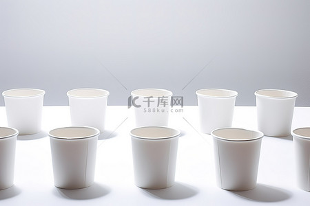 白色茶几背景图片_纸杯系列白色茶几带桌布