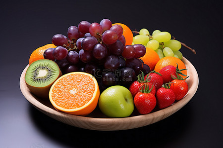 健康的水果背景图片_盛满色彩缤纷的水果和蔬菜的碗