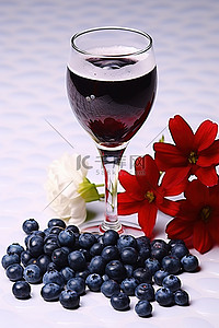 蓝莓樱桃背景图片_蓝莓配酒花和咖啡杯