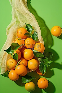 陈皮普洱背景图片_绿色背景袋中的新鲜柑橘 500px pxpnrsprf3890659009