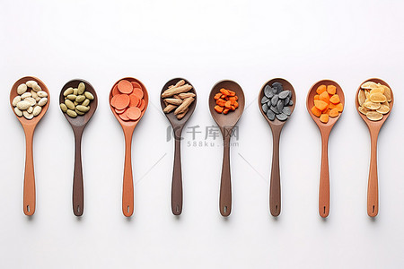 器械器械背景图片_多彩多姿的勺子与不同种类的食物