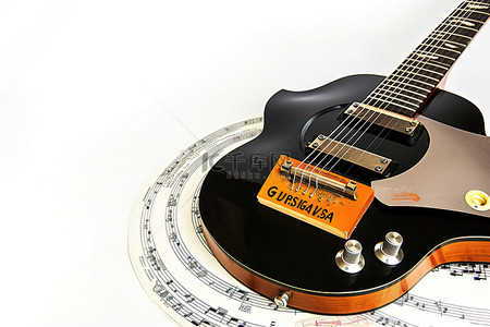 唱片公司背景图片_一把带有旧唱片和唱片公司的吉他