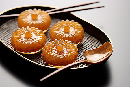 筷子传统背景图片_一套带有叉子和筷子的越甜点