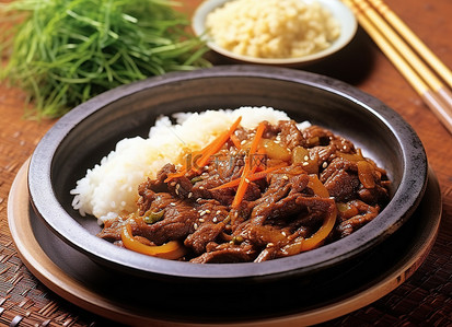 米饭拌饭料背景图片_韩国炖牛肉配胡萝卜白菜和米饭在托盘上
