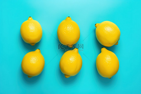 六个六背景图片_六个柠檬面朝下放在绿松石色的表面上