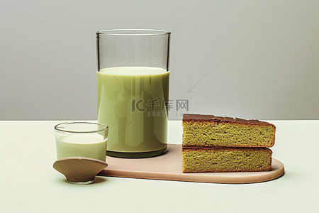 绿茶茶叶背景图片_杏仁蛋糕和冰牛奶