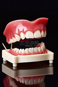 舔舌头的狗背景图片_牙齿塑料刷和舌头模型
