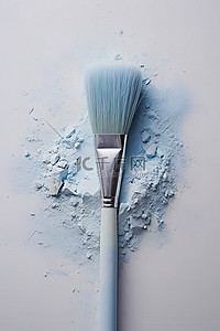 化妆刷背景图片_两把被蓝色粉末包围的化妆刷