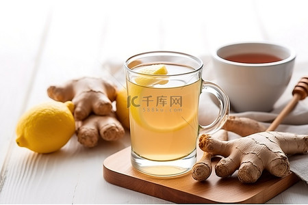 星空柠檬茶背景图片_白桌上放着柠檬的热姜茶