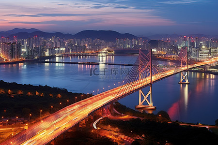 水桥城市背景图片_夜间水桥山和城市高速公路的鸟瞰图
