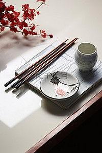 筷子传统背景图片_一个托盘放在两根筷子和风扇前面