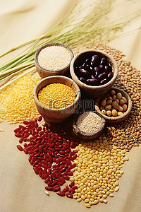 豆类背景图片_草巾上各种不同种类的谷物豆类种子和坚果