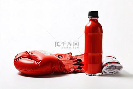 白色背景中的红色拳击手套和水瓶，配有红色衬衫和红色手套