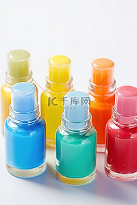 甲油瓶背景图片_白色表面上的多彩多姿的指甲油瓶