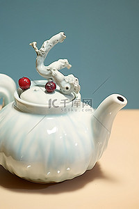 茶具茶具logo背景图片_桌上有红色浆果的白色茶壶