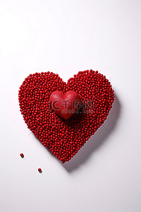 红心背景图片_白色表面上的一颗红心