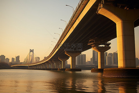 水桥城市背景图片_一座大城市中横跨水面的桥梁