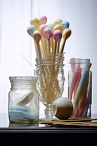 桌子上的罐子背景图片_桌子上的罐子里有糖果棒