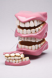 咬人背景图片_显示了一组陶瓷模型牙齿
