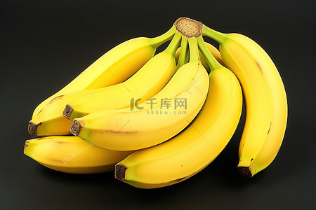 新鲜香蕉背景图片_四根去蒂的黄色香蕉