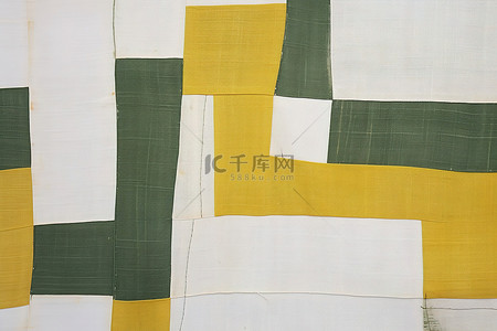 绿色和黄色背景图片_一条毯子有绿色和黄色的被子设计