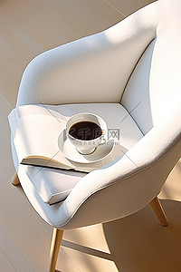 一把白色的椅子，上面放着咖啡和书
