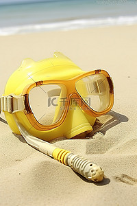 海滩上的黄色潜水面罩通气管和护目镜