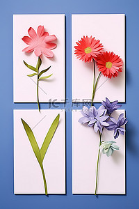 蓝色菊花背景图片_四朵花排列在蓝色表面的纸上