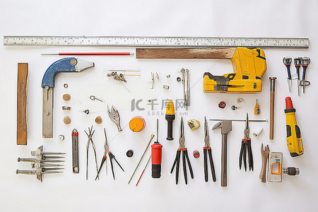 桌面用品背景图片_白色桌面上的工具硬件和建筑用品