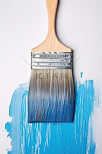 一把艾草背景图片_一把旧的蓝色画笔被用来粉刷墙壁