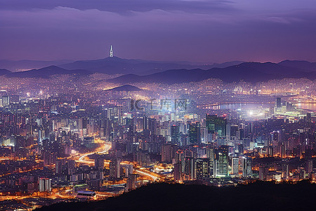 城市下景背景图片_夜晚的首尔城在灯光的照耀下