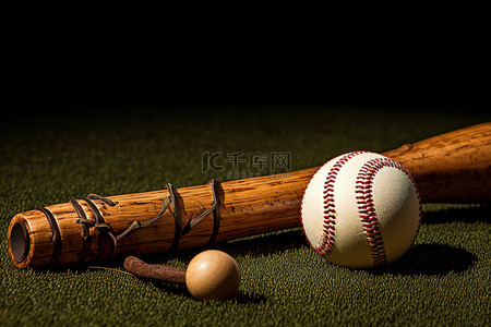 一根草背景图片_一个网球和一根棒球棒坐在地上
