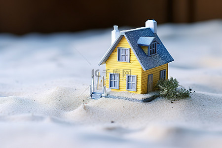雪中的小房子背景图片_雪中​​的黄色小房子