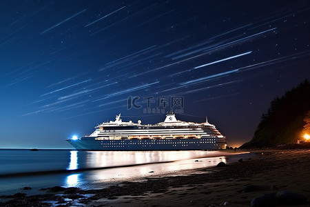 轨背景图片_夜色中的游轮围绕海滩星轨