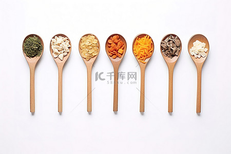 勺子背景图片_不同的食物排列在医用勺子里