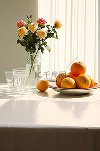 一张白色的桌子，上面有一些水果和一些餐具
