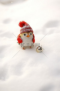 雪背景图片_坐在雪地里的小雪人