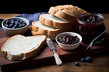 美味的水果背景图片_美味的自制面包和蓝莓果酱