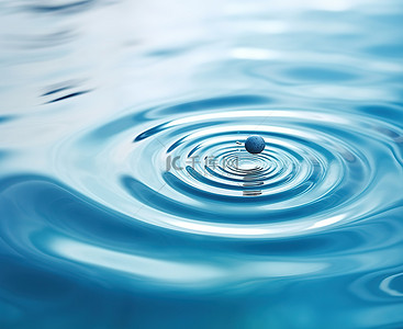 简单水背景图片_蓝色水面上的水滴和涟漪