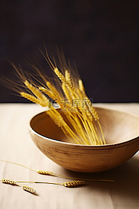 小麦黄色背景图片_有黄色小麦树枝的木碗