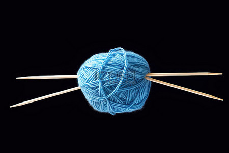 线背景球背景图片_蓝色纱线在织针中间的球中旋转