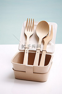 叉子和勺子背景图片_带叉子和勺子的塑料容器