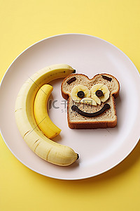 盘子里有香蕉和香蕉面包的表情符号三明治