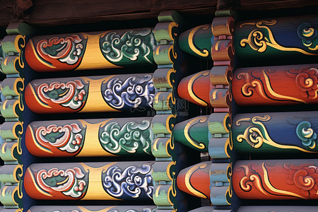 韩国传统图案背景图片_韩国寺庙墙壁上色彩缤纷的木雕