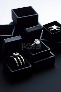 这些镶有钻石的黑色珠宝盒装有戒指