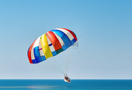 一名男子在滑翔伞板上漂浮在空中