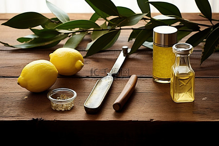 旧木桌上的橄榄油和柠檬削皮器